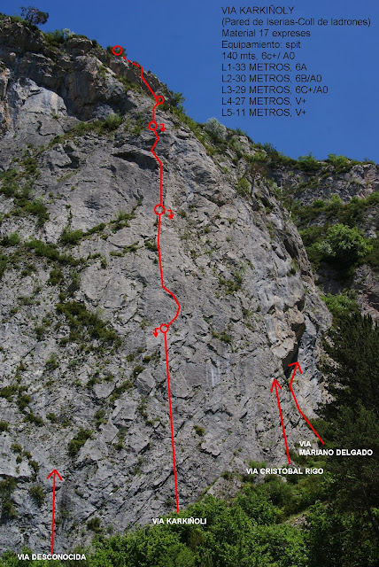Vía Karkiñoli 140m (6c+/A0), placas a la sombra. Canfranc estación.